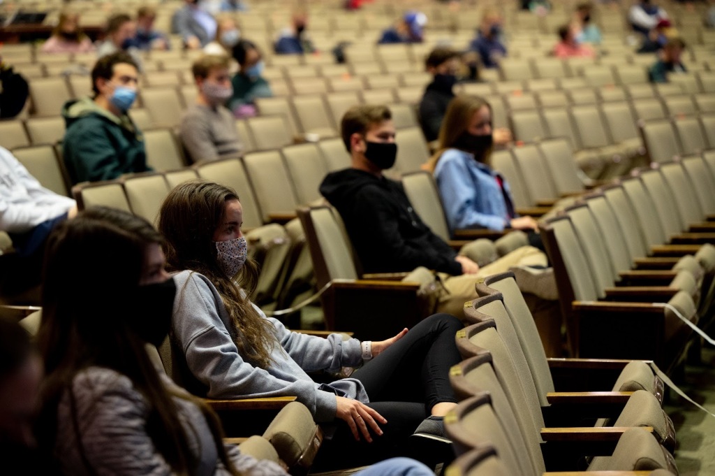 Photo of students attending chapel in the Benson Auditorium.