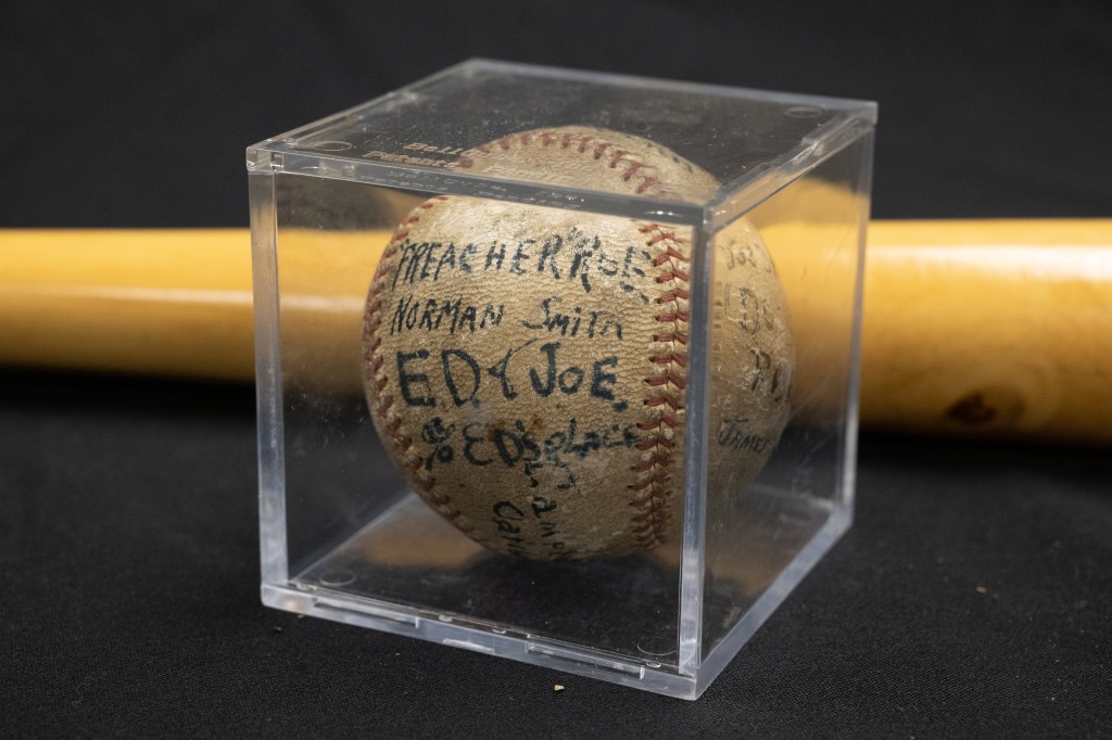 Photo of a baseball signed by Preacher Roe.