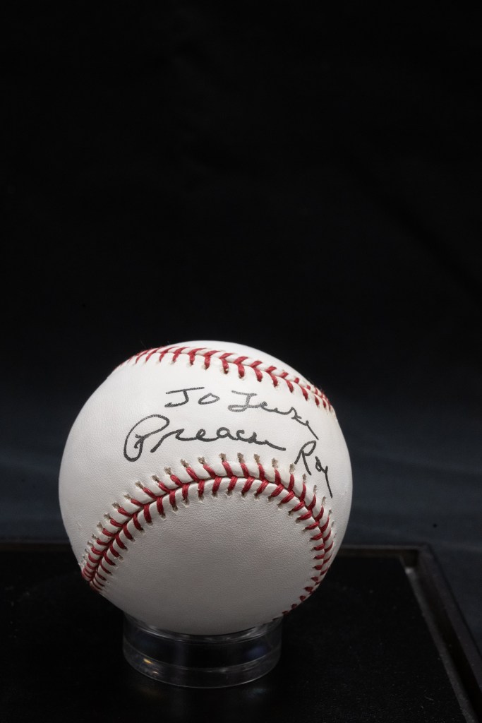 Photo of a baseball signed by Preacher Roe.